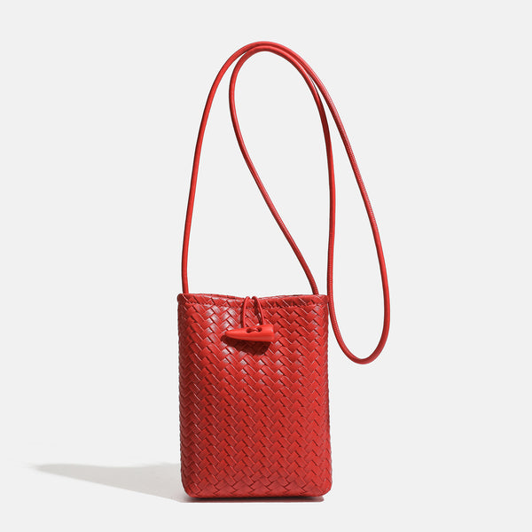 Compact woven leather-look bucket crossbody pouch with toggle closure and long fixed strap, detail view 6