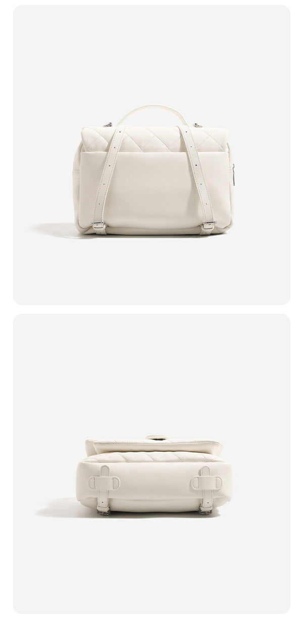 Diamond-quilted flap backpack handbag with silver-tone flower turn-lock, top handle, and dual shoulder straps, detail view 14