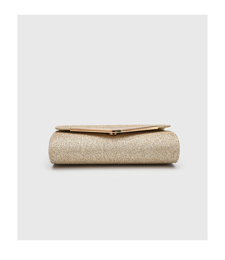 Structured glitter envelope clutch bag with gold-tone V-bar hardware and detachable chain strap, detail view 10