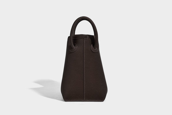 Small structured matte pebbled tote bag with twin top handles and removable zip pouch, detail view 19