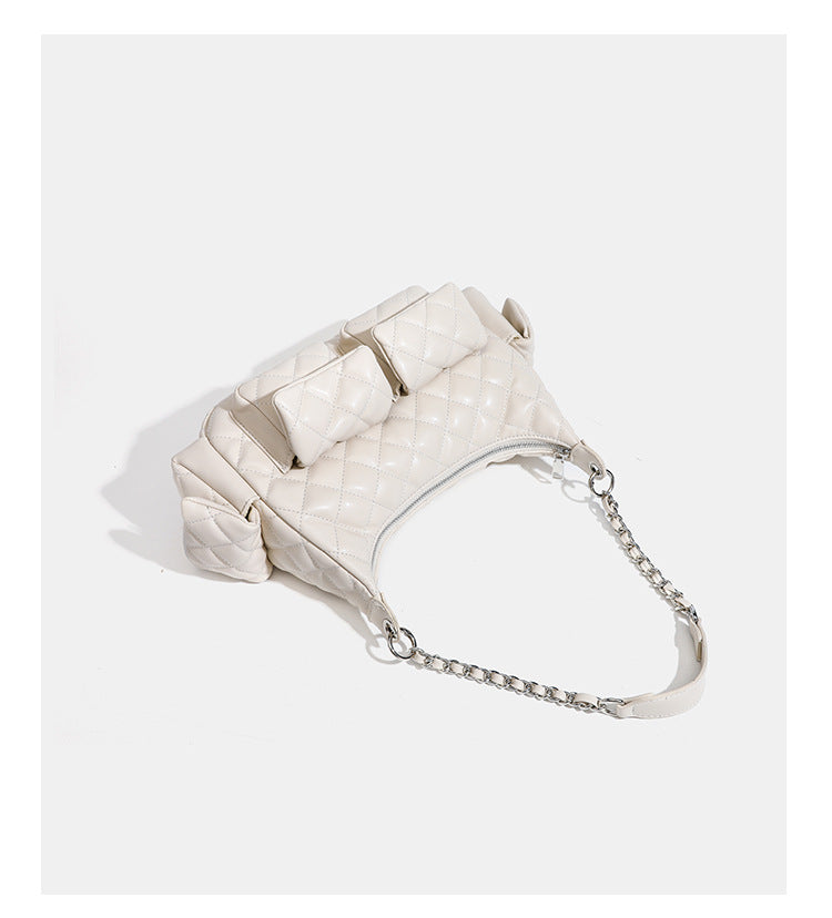 Off-white quilted leather-look hobo shoulder bag with diamond stitching, chain-and-strap handle, two front flap pockets