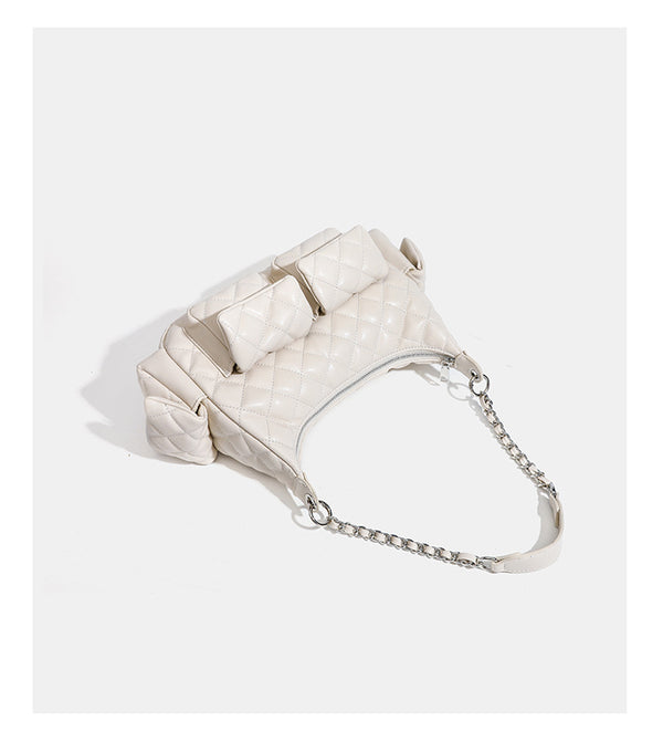 Off-white quilted leather-look hobo shoulder bag with diamond stitching, chain-and-strap handle, two front flap pockets