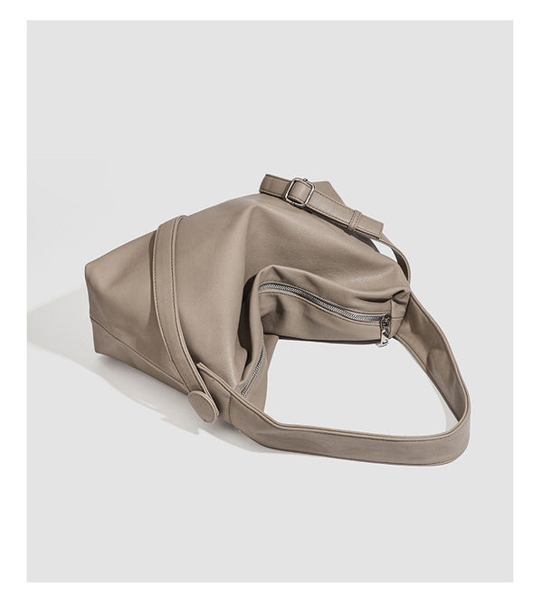 Slouchy leather-look hobo shoulder bag with top zipper and silver-tone hardware, detail view 18