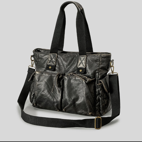 Slouchy crinkled pebbled leather-look convertible tote bag in gunmetal black with woven top handles, adjustable shoulder