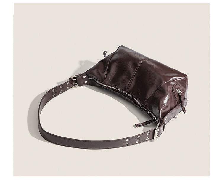 Glossy crinkled mini hobo shoulder bag with studded adjustable strap and silver-tone hardware, detail view 20