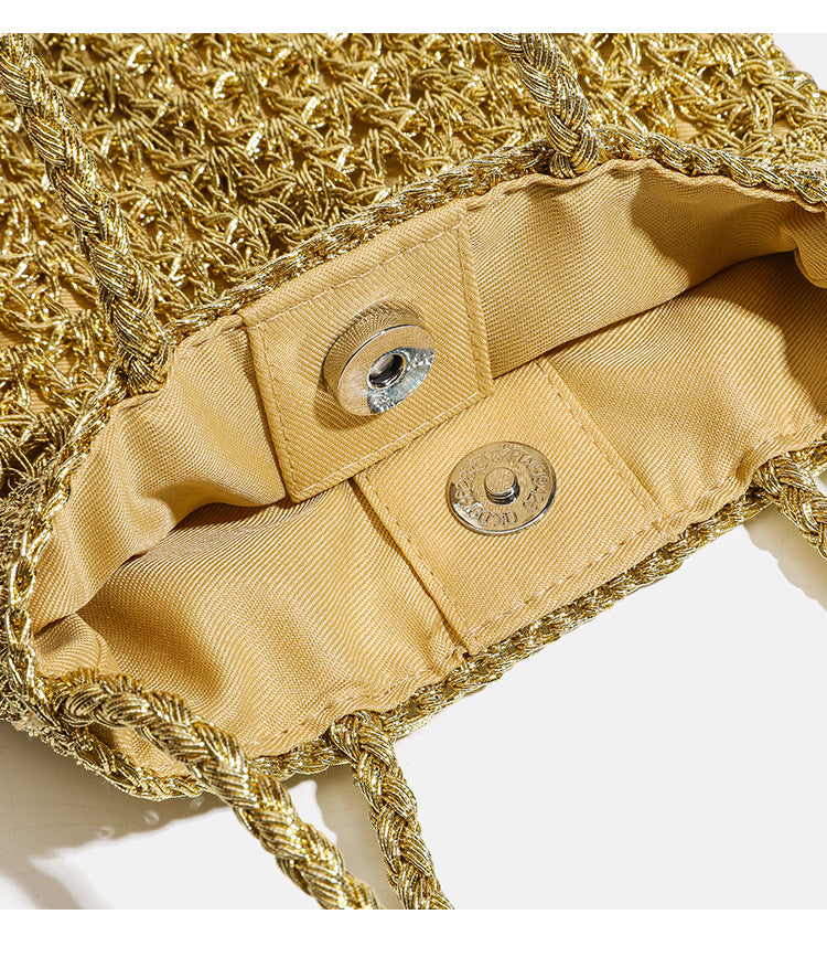Small soft rectangular metallic crochet-weave shoulder bag with braided top handle and long crossbody strap, detail view 11