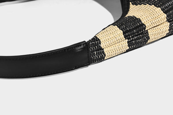 Black and beige striped woven shoulder tote bag with leather-look trim and detachable black zip pouch, detail view 17