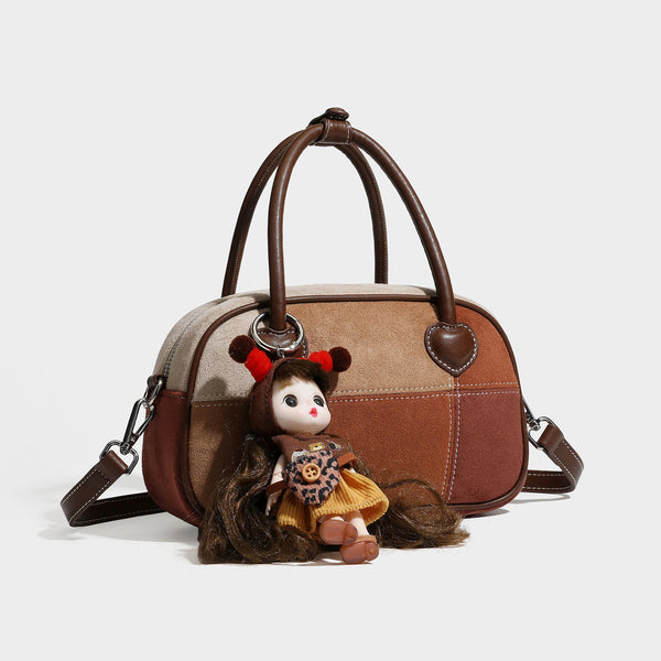Kleine strukturierte Satchel-Tasche im Patchwork-Design mit Feldern in Beige, Camel, Braun und Rost, dunkelbrauner Besatz, herzförmigem