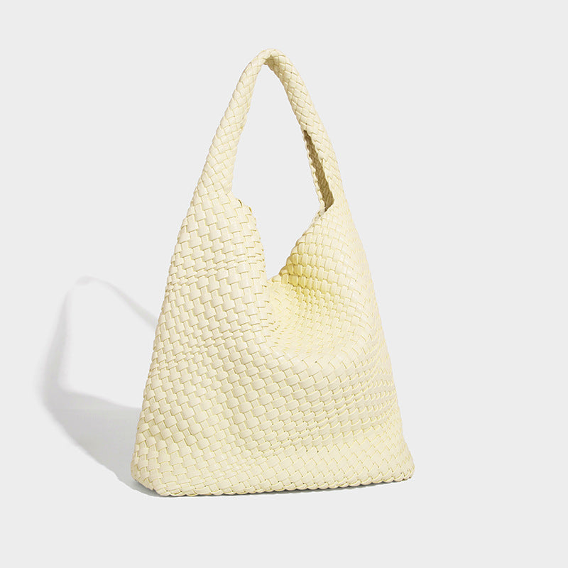 Soft hand-woven slouchy hobo tote bag with knotted tassel charm and single looped shoulder strap, detail view 33