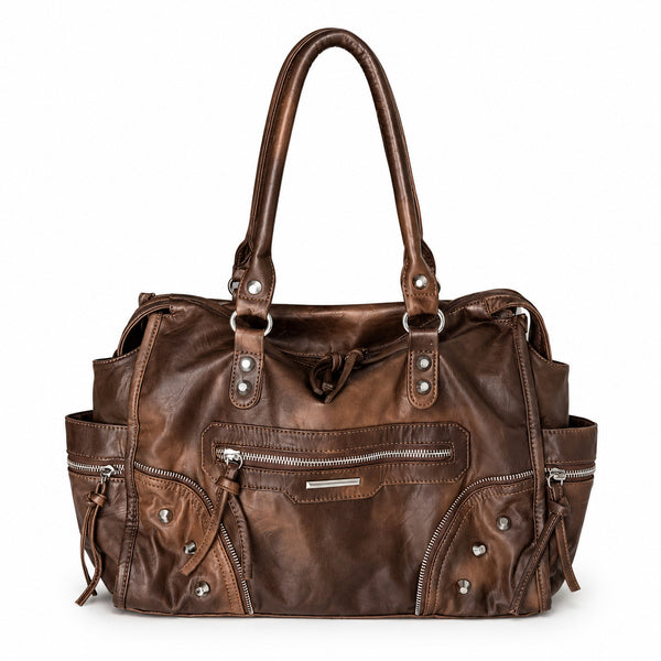 Large distressed leather-look moto tote bag with silver rivets, tassel zip pulls, front zip pocket, and dual top handles