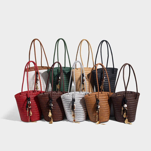Chevron-woven bucket tote bag with braided shoulder straps and matching drawstring pouch, detail view 2