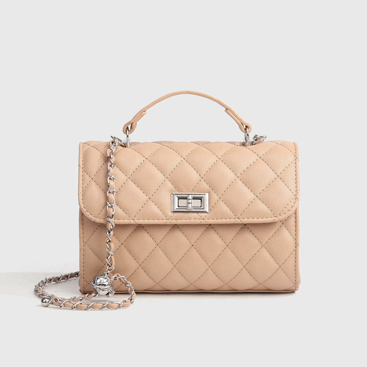 Small structured diamond-quilted flap satchel bag with silver-tone chain strap and turn-lock closure, detail view 9