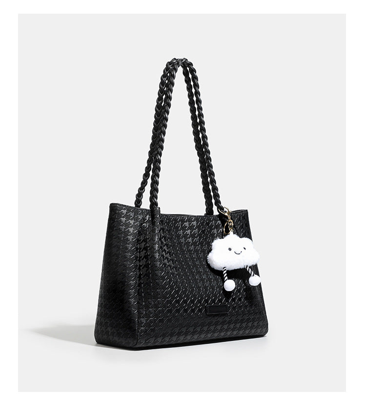 Structured geometric-embossed tote bag with braided shoulder straps and gold-tone hardware in ivory, detail view 13