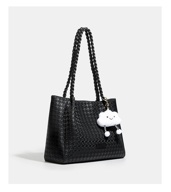 Structured geometric-embossed tote bag with braided shoulder straps and gold-tone hardware in ivory, detail view 13