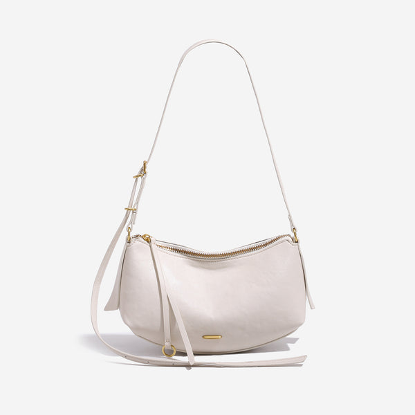 Halbmondförmige Sattel-Crossbody-Tasche mit Reißverschluss oben, verstellbarem Riemen und Beschlägen in Goldoptik, Detailansicht 9