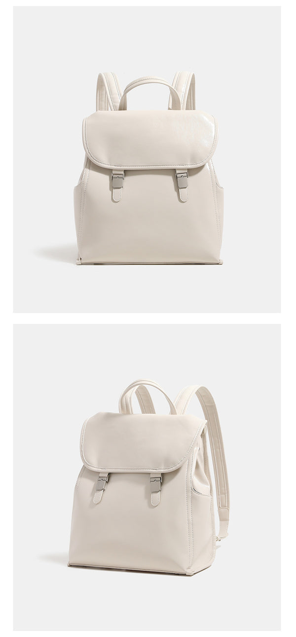 Structured glossy leather-look flap backpack with twin buckle closures and top grab handle, detail view 12
