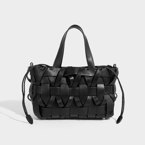 Structured woven basket tote handbag with contrasting dark trim, double top handles, detachable shoulder strap, and