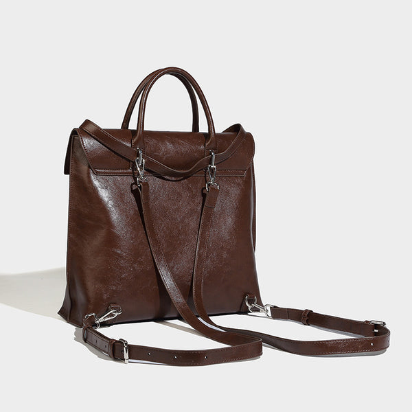 Große glänzende wandelbare Tote-Bag in Lederoptik mit Plüschbären-Anhänger und silberfarbenen Beschlägen, Detailansicht 18