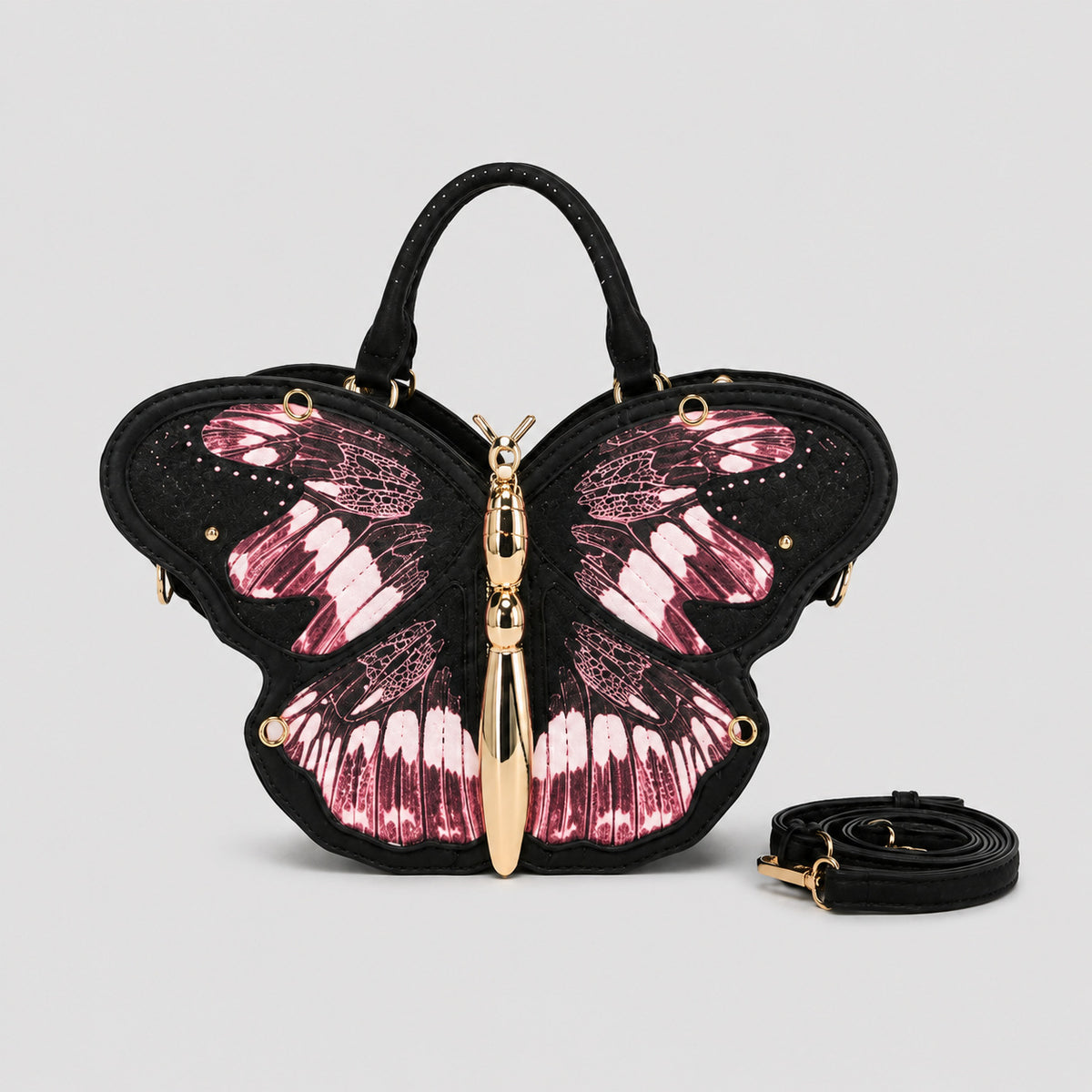 Schwarze Handtasche in Schmetterlingsform mit rosafarbenem Flügelprint und goldfarbenem, skulpturalem Schmetterlingskörper als Zipper, Detailansicht 14