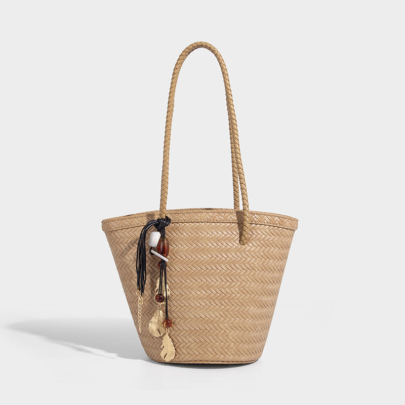 Chevron-woven bucket tote bag with braided shoulder straps and matching drawstring pouch, detail view 12