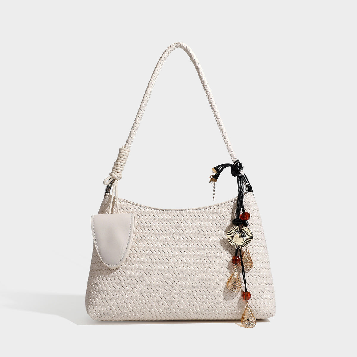 Woven-texture hobo shoulder bag in brown with braided top handle, adjustable crossbody strap, front flap pocket, and, detail