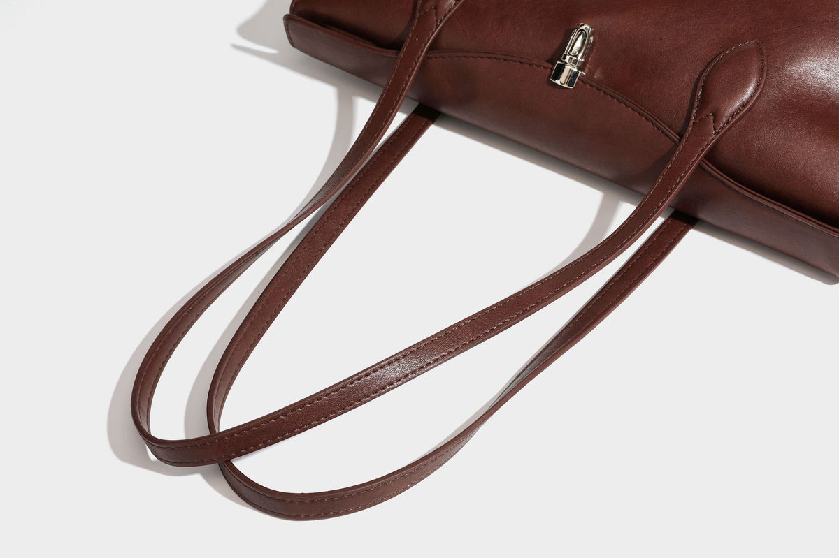 Large leather-look tote shoulder bag with slim double straps and silver-tone turn-lock closure, detail view 37
