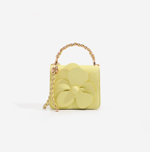 Small structured rectangular crossbody bag with layered 3D flower appliqué and gold-tone chain strap, detail view 7