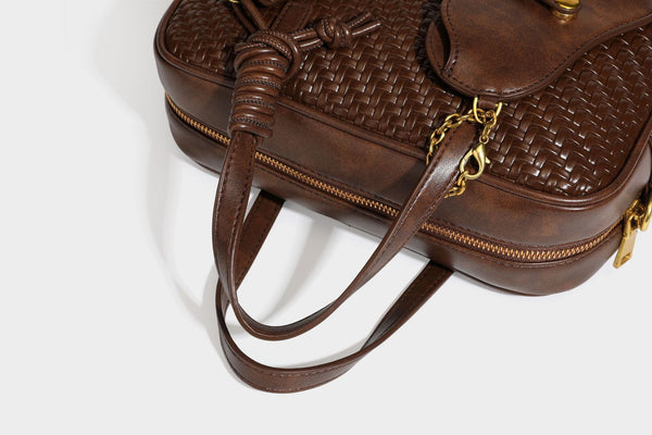 Strukturierte rechteckige Satchel-Tasche mit gewebtem Vorderteil in Lederoptik, goldfarbenen Details, zwei Tragegriffen und abnehmbarem