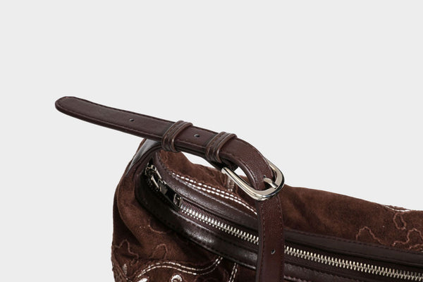 Deep chocolate suede-look hobo shoulder bag with tonal paisley floral embroidery, smooth dark leather-look trim, top zip
