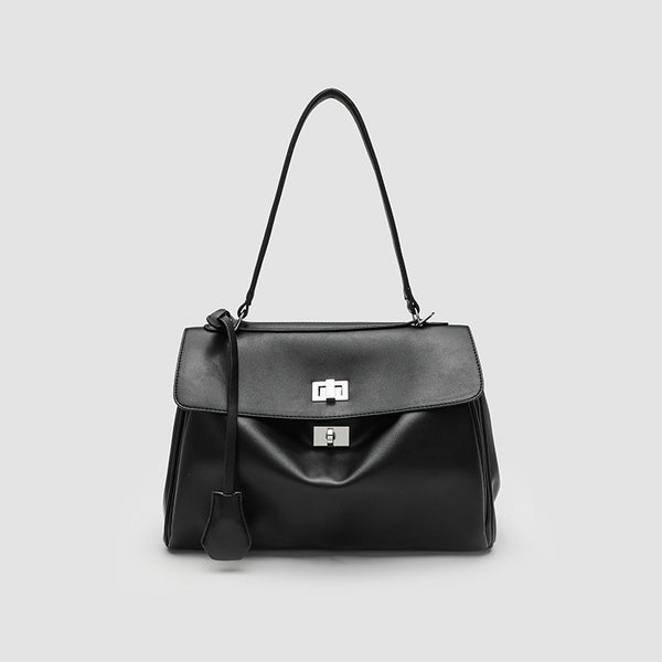 Structured black leather-look flap satchel bag with silver turn-lock hardware and top handle, front view