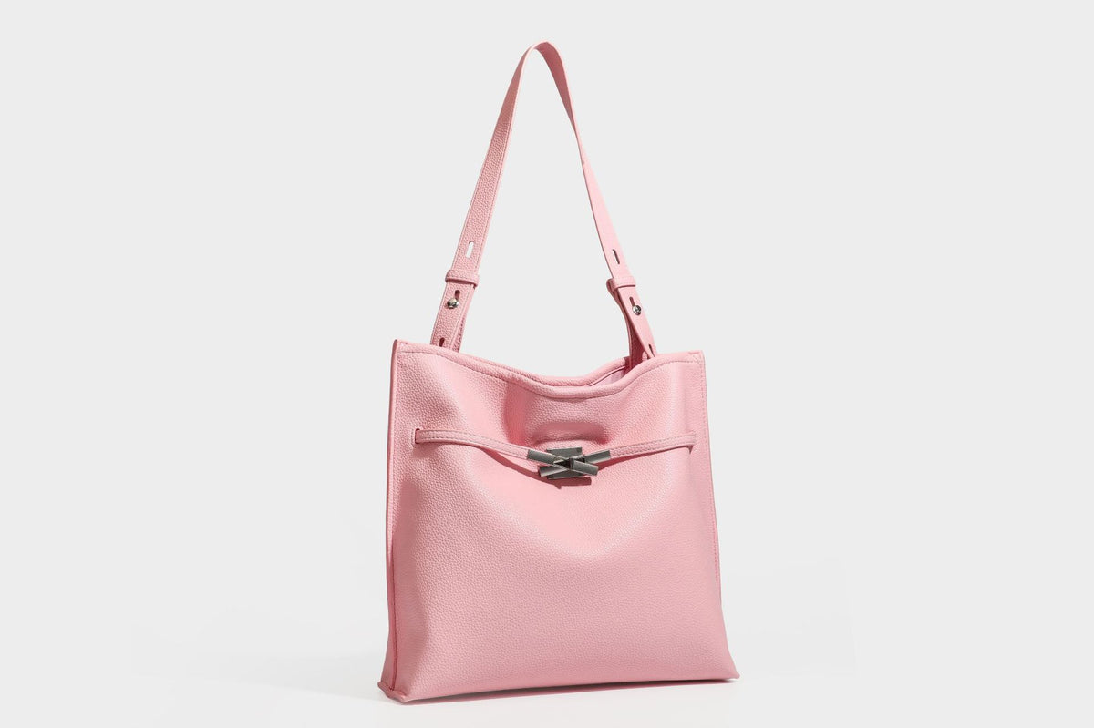 Pebbled leather-look tote bag with front toggle hardware and long shoulder strap, detail view 34