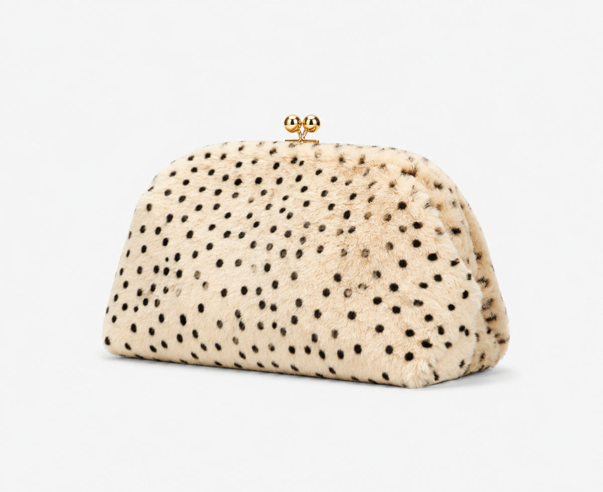Rounded spotted faux-fur kiss-lock clutch bag with gold-tone chain strap in cream with black dot print, detail view 12