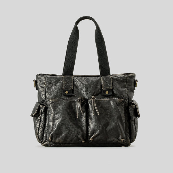 Slouchy crinkled pebbled leather-look convertible tote bag in gunmetal black with woven top handles, adjustable shoulder
