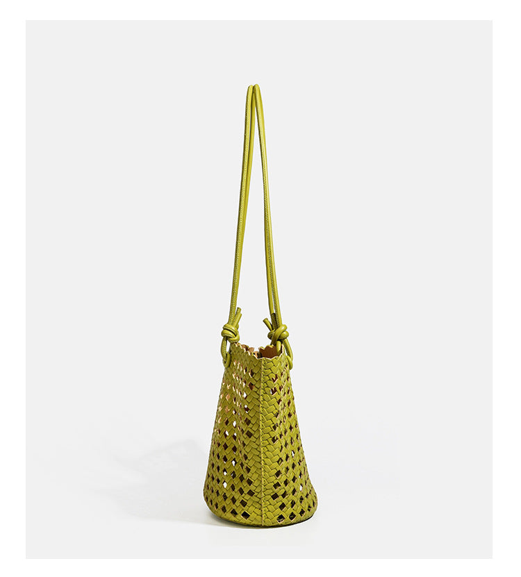 Open-weave lattice bucket tote bag with long knotted cord handles and tapered silhouette, detail view 15