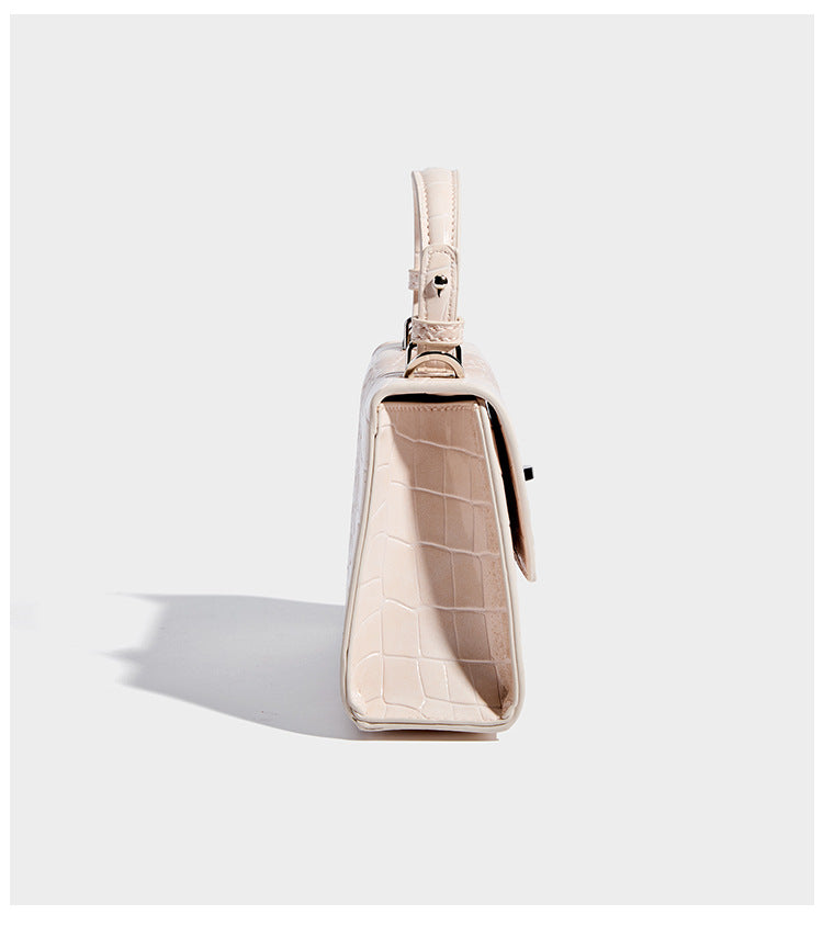 Small structured crocodile-embossed glossy top-handle satchel bag with silver-tone turn-lock clasp and detachable shoulder