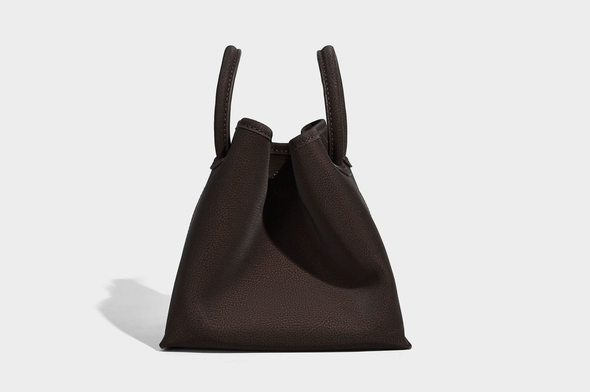 Small structured matte pebbled tote bag with twin top handles and removable zip pouch, detail view 20