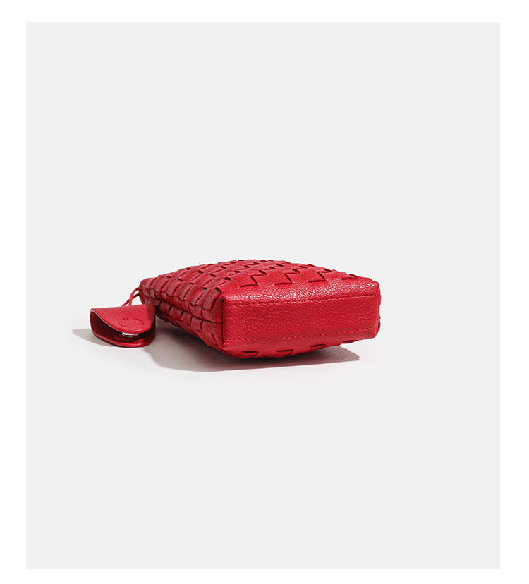 Mini woven square-pattern crossbody phone bag with long cord strap and front snap flap pocket in red textured leather-look