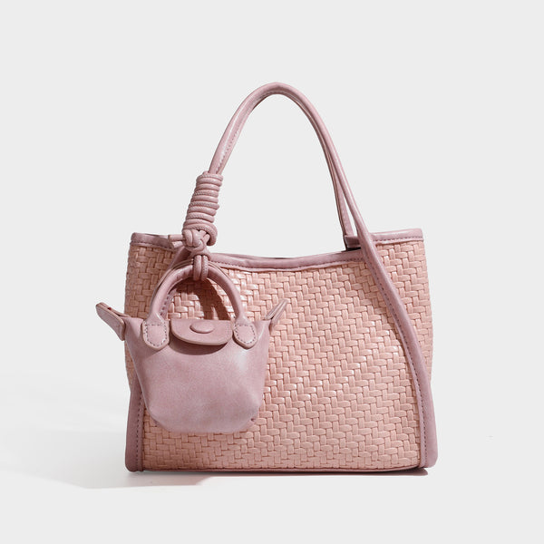 Strukturierte Tote Bag mit Webstruktur in Braun, glatten Besätzen in Lederoptik, geknoteten Tragegriffen und befestigtem Mini-Beutel mit Kordelzug