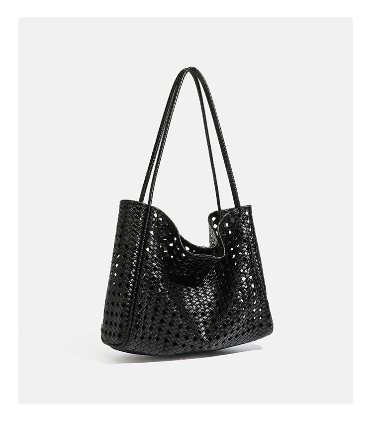 Slouchy open-lattice woven shoulder tote bag with long braided straps and matching zip pouch, detail view 17