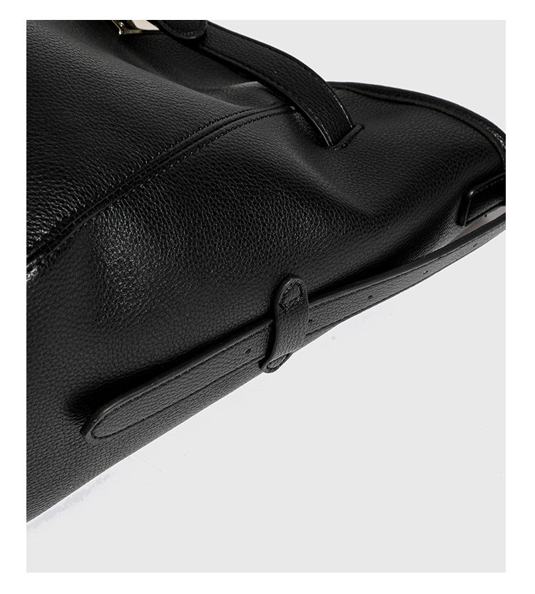 Large black pebbled leather-look hobo shoulder bag with silver-tone turn-lock front hardware and single flat adjustable