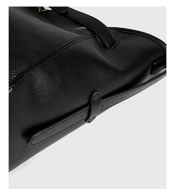 Large black pebbled leather-look hobo shoulder bag with silver-tone turn-lock front hardware and single flat adjustable