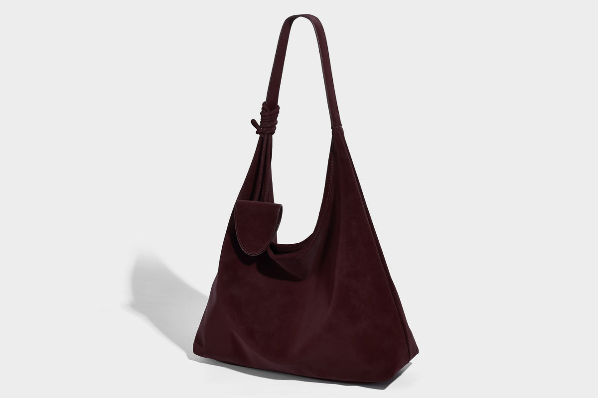 Slouchy oversized matte suede-look shoulder tote bag with knotted strap and attached front flap pouch, detail view 12
