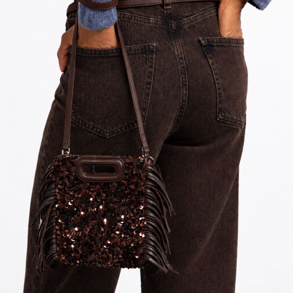 Small structured dark brown sequin handbag with leather-look fringe side trim and top cutout handle, detail view 2
