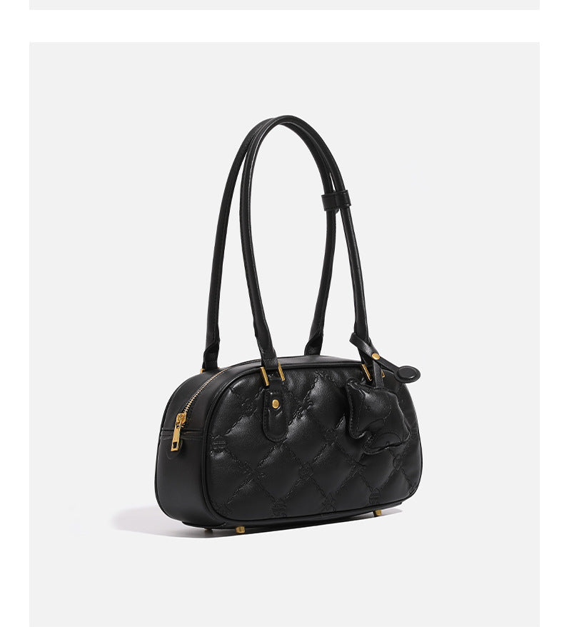 Small structured quilted leather-look zip shoulder bag with gold-tone hardware and adjustable strap, detail view 9