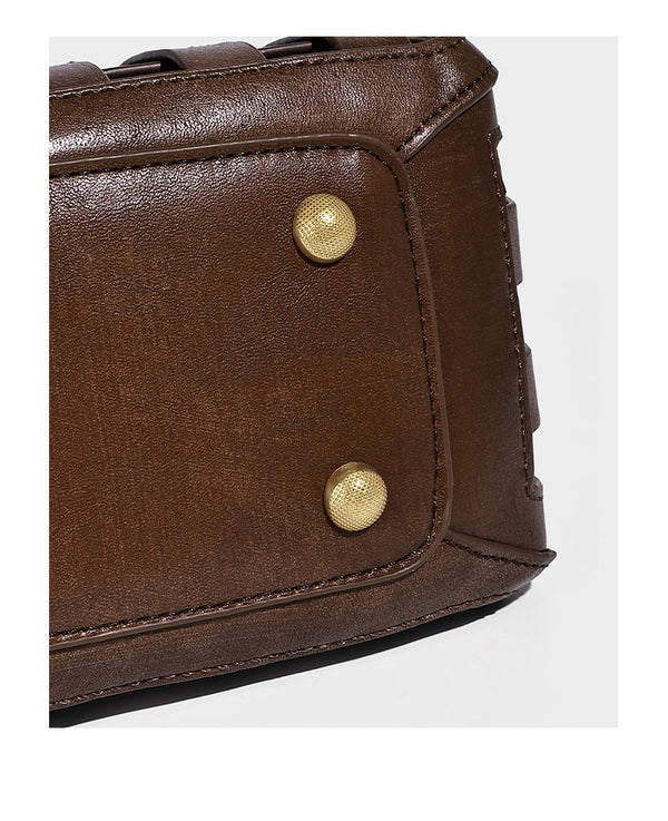 Small structured woven lattice top-handle satchel bag with bead-and-tassel charm and gold-tone hardware, detail view 12
