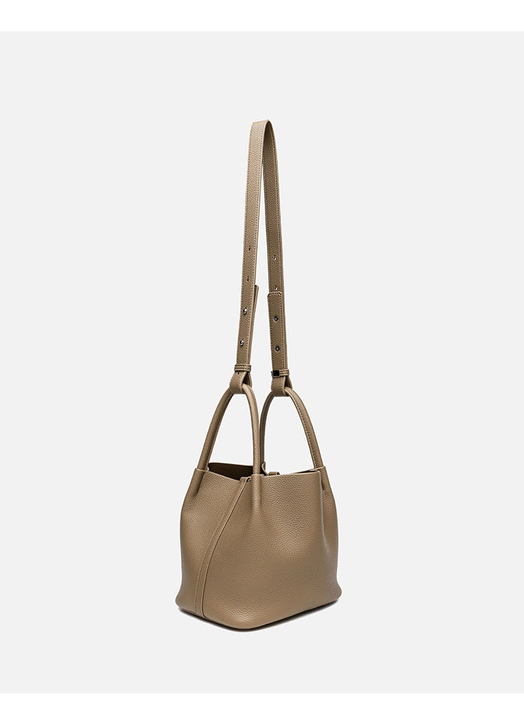 Pebbled leather-look bucket tote bag with rounded top handles and detachable shoulder strap, detail view 13