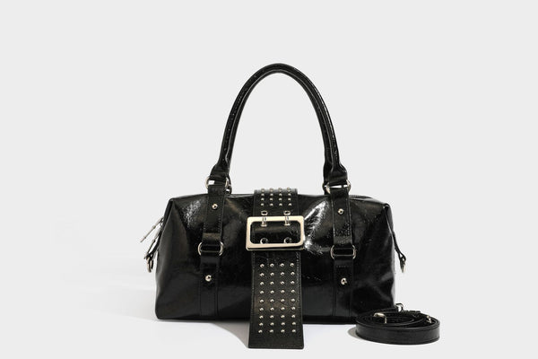 Glossy crinkled barrel handbag with silver stud buckle strap and detachable shoulder strap, detail view 24