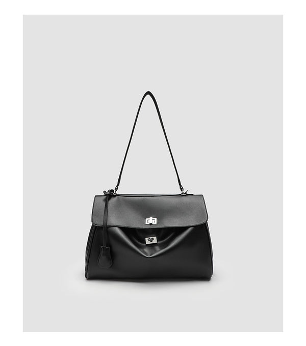 Structured black leather-look flap satchel bag with silver turn-lock hardware and top handle, detail view 19