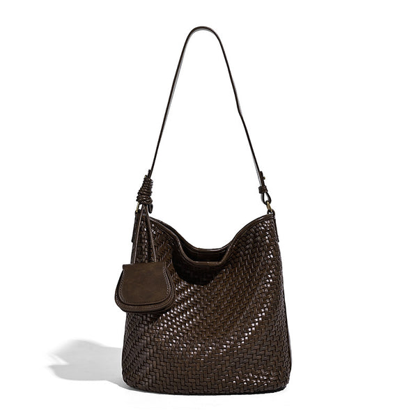 Woven leather-look bucket bag with basket-weave texture, attached mini pouch, and adjustable shoulder strap, detail view 5