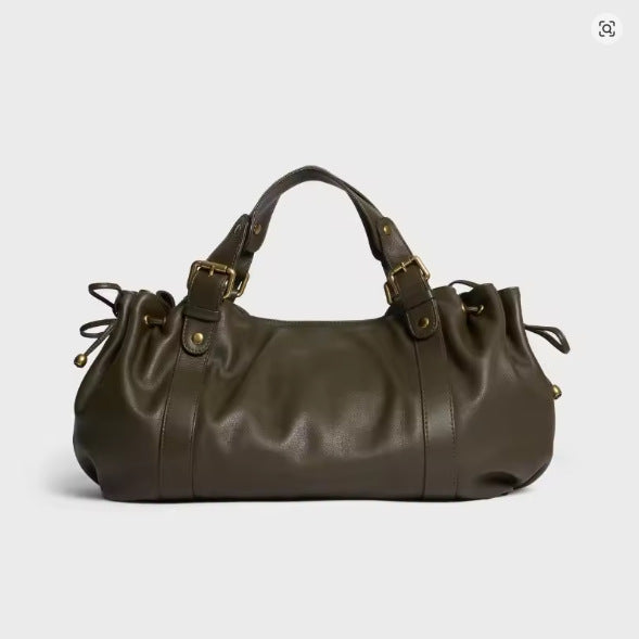Lässige Barrel-Shopper-Tasche mit seitlichen Zugbändern, zwei Tragegriffen und goldfarbenen Schnallenbeschlägen, Detailansicht 7